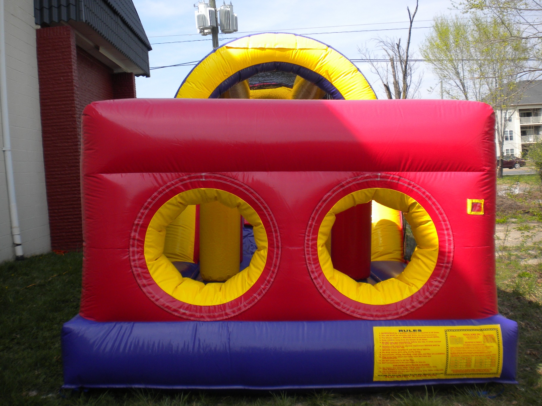 Front view of 40' Backyard Obstacle Challenge Inflatable Moonbounce