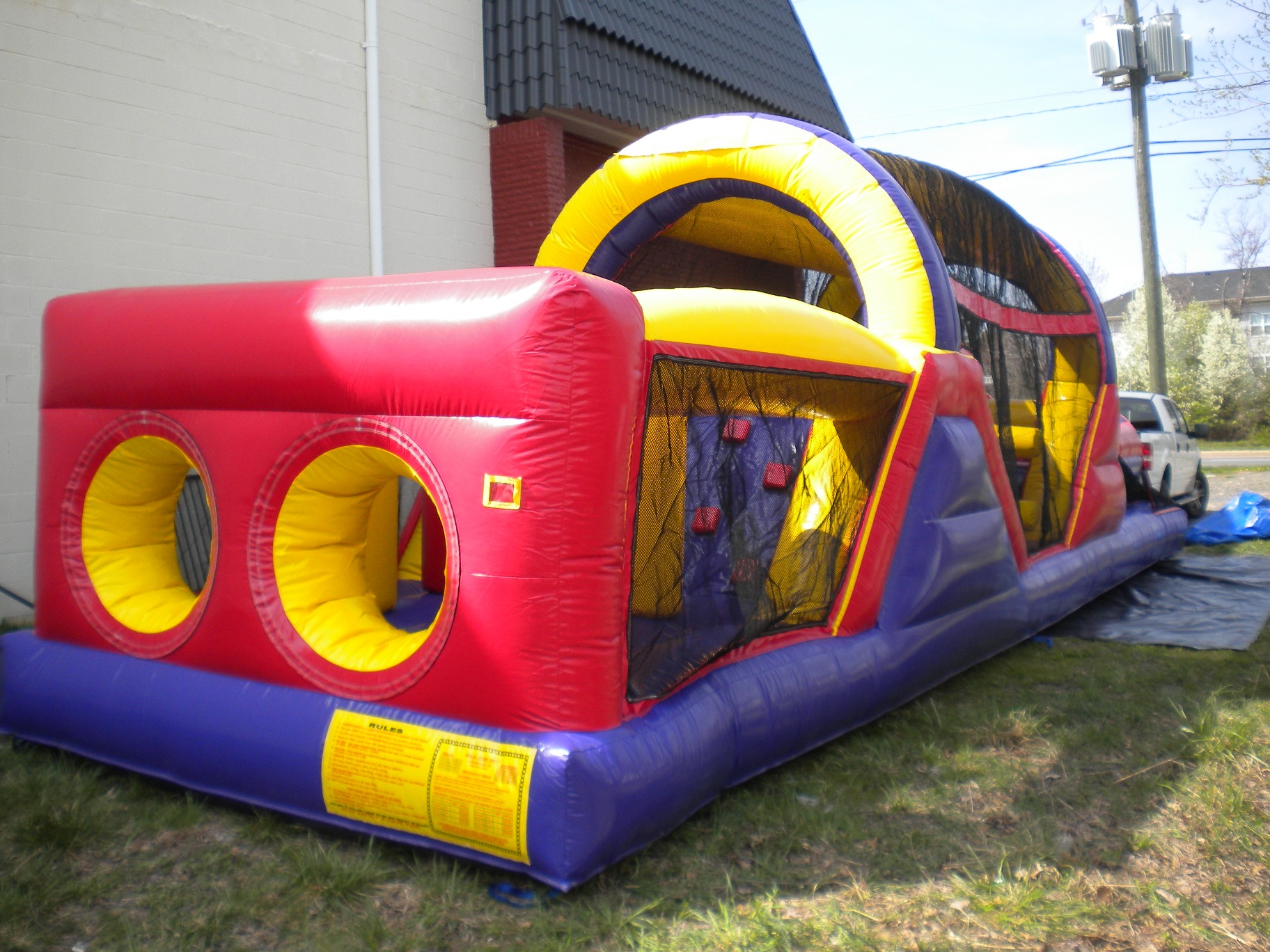 Front right side view of 40' Backyard Obstacle Challenge Inflatable Moonbounce