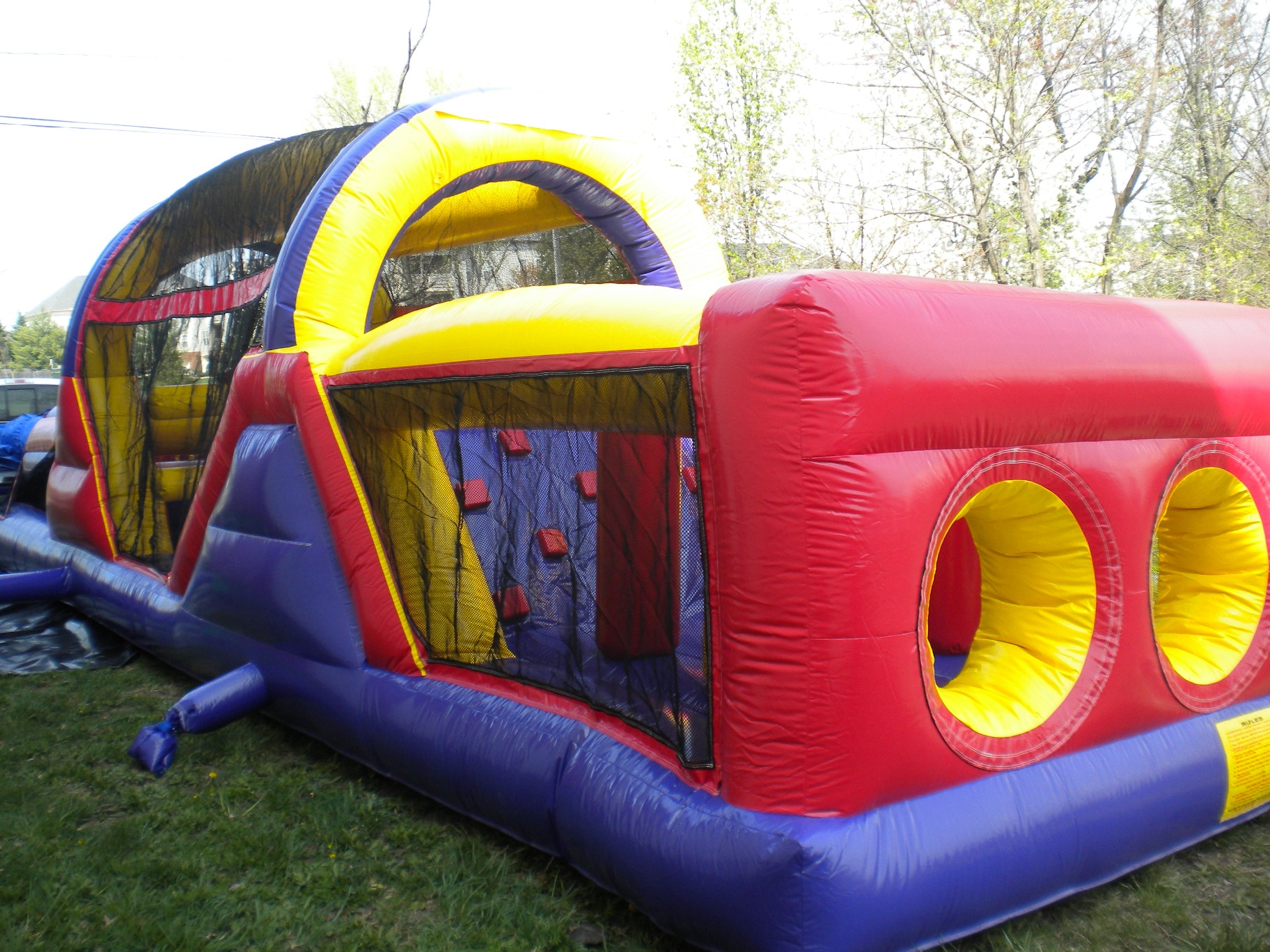 Front left side view of 40' Backyard Obstacle Challenge Inflatable Moonbounce