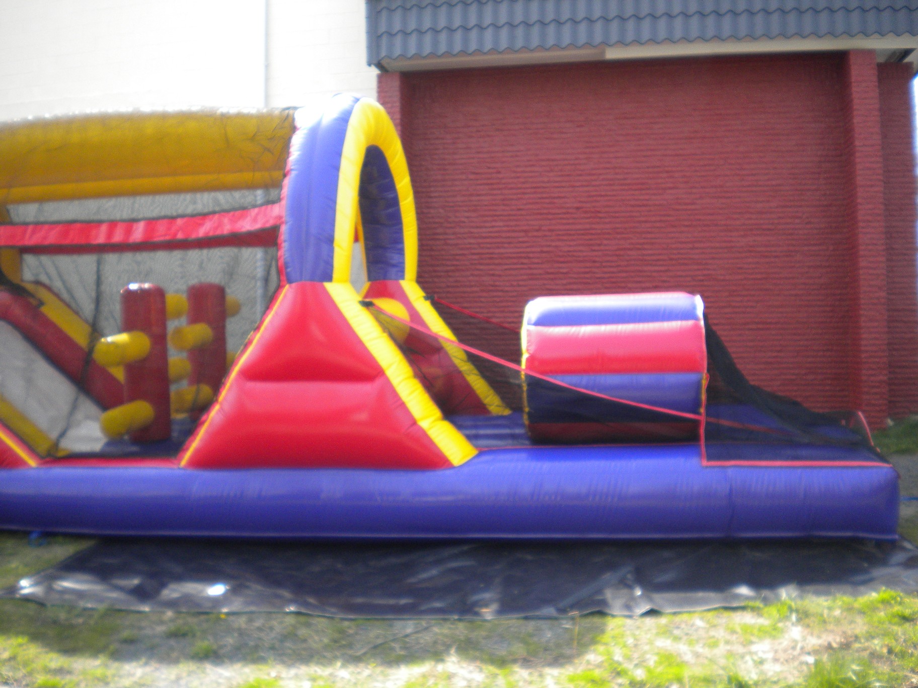 Rear right side view of 40' Backyard Obstacle Challenge Inflatable Moonbounce
