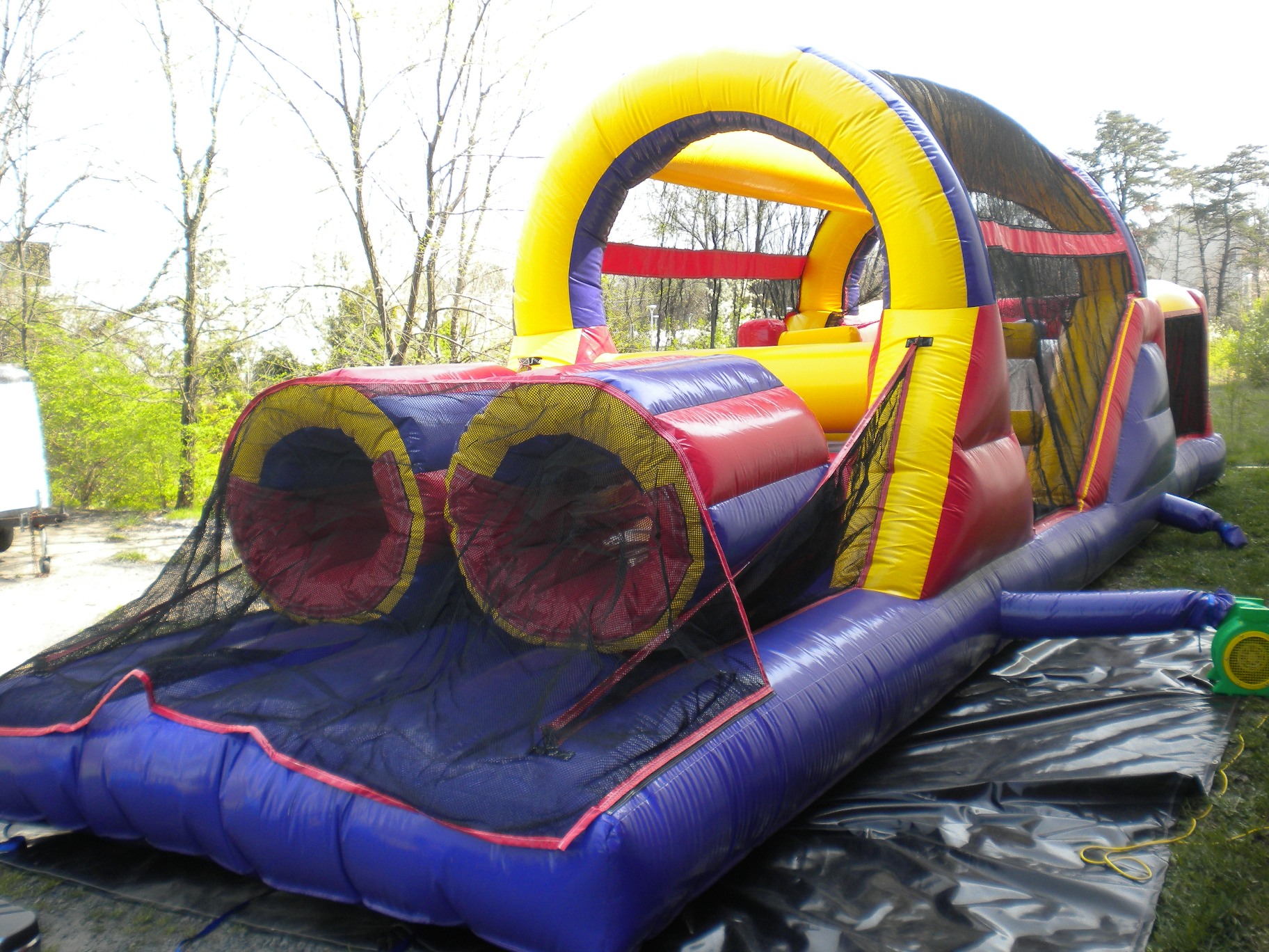 Rear Left side view of 40' Backyard Obstacle Challenge Inflatable Moonbounce