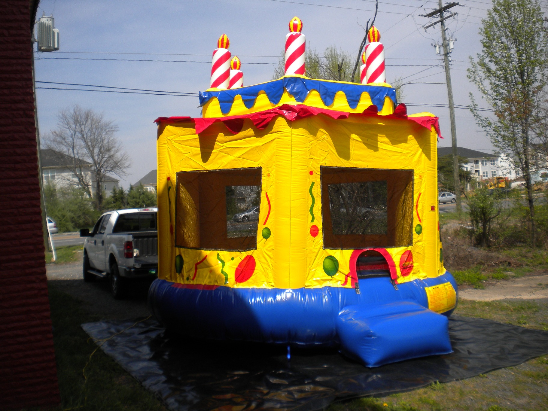 Cake Jumper Moonbounce Bounce House Front Left View